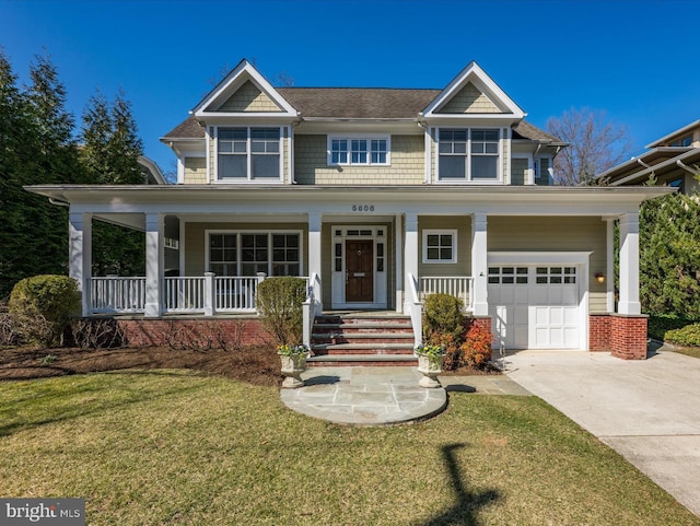 view of front of house featuring a front lawn, a garage, covered porch, and driveway