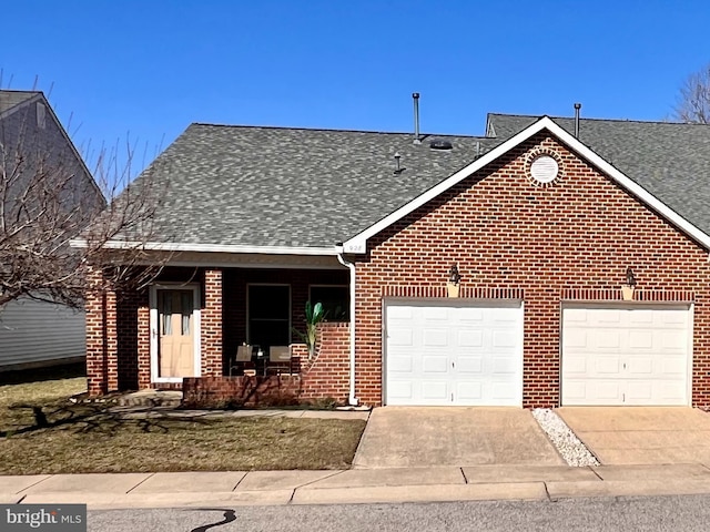 single story home with a porch, an attached garage, brick siding, driveway, and roof with shingles