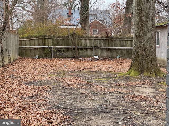 view of yard with fence