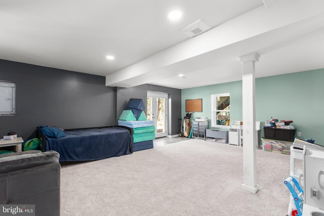 carpeted bedroom with recessed lighting