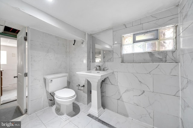 bathroom featuring toilet