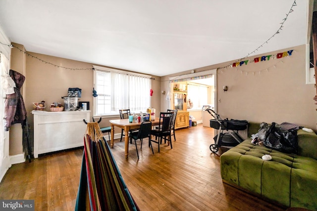 dining area featuring hardwood / wood-style floors