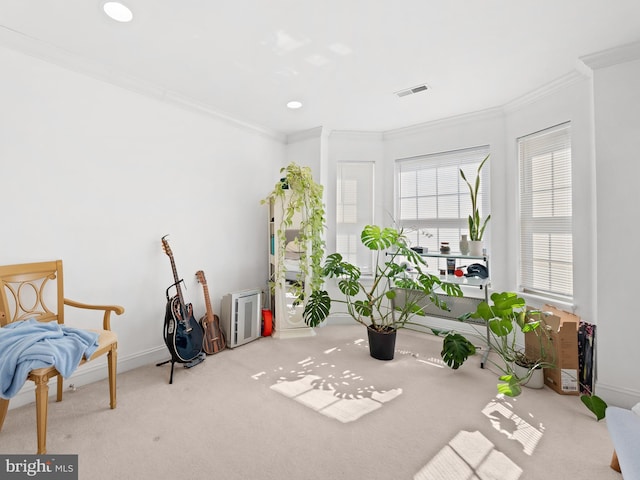 interior space with visible vents, crown molding, baseboards, carpet flooring, and recessed lighting