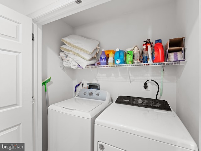 laundry area featuring washer and dryer and laundry area