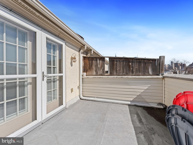 view of patio featuring fence