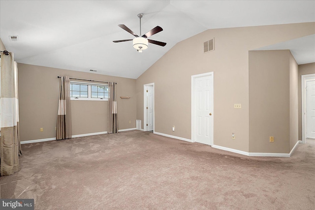 carpeted empty room featuring a ceiling fan, visible vents, and baseboards