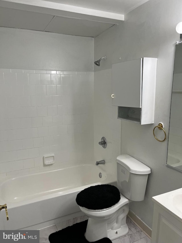 full bathroom featuring baseboards, toilet, marble finish floor, tub / shower combination, and vanity