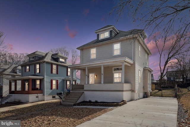 traditional style home featuring a porch