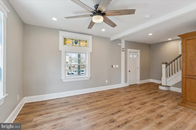 entryway with light wood-style floors, recessed lighting, baseboards, and stairs