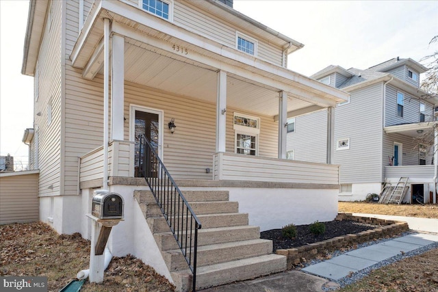 view of front of home featuring covered porch