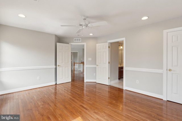 unfurnished bedroom with baseboards, recessed lighting, visible vents, and light wood-type flooring