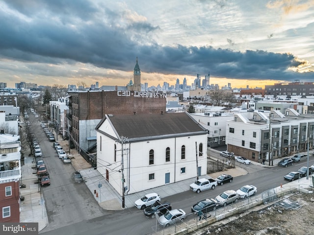 aerial view at dusk with a city view