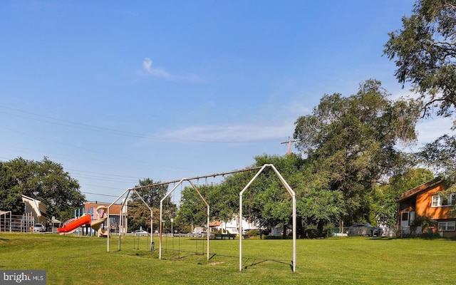 community play area with a yard