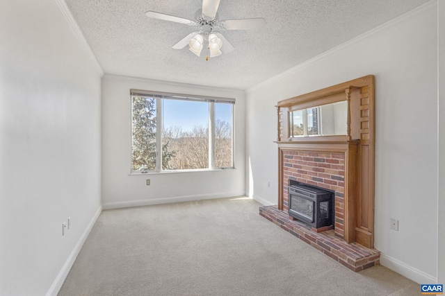 unfurnished living room featuring carpet, ornamental molding, a wood stove, a textured ceiling, and baseboards