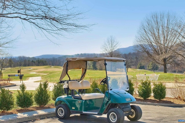 view of parking with a mountain view