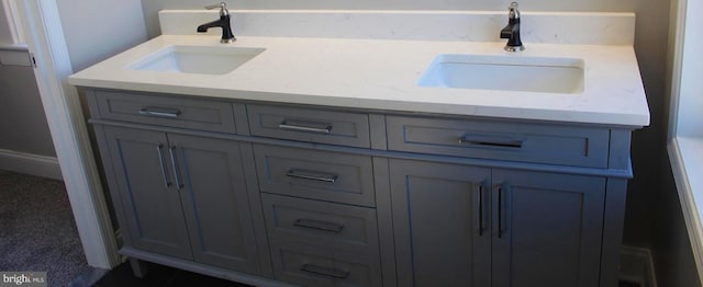 full bathroom featuring a sink