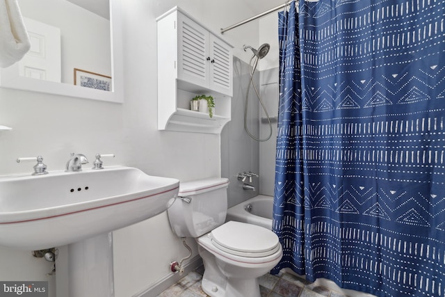 bathroom with toilet and shower / bath combo with shower curtain