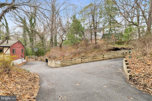 view of road with driveway