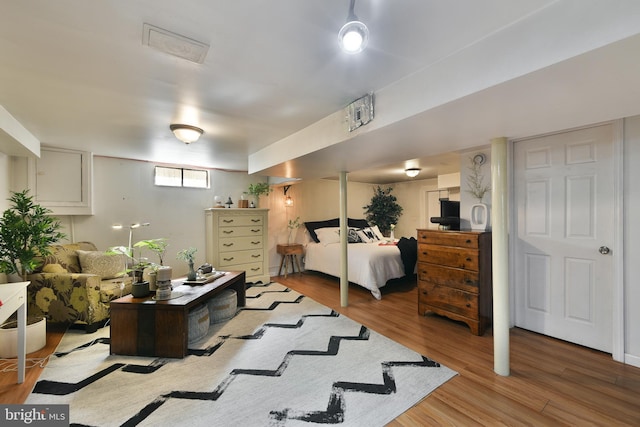 bedroom with light wood finished floors