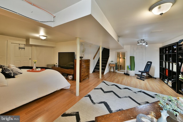 bedroom featuring wood finished floors