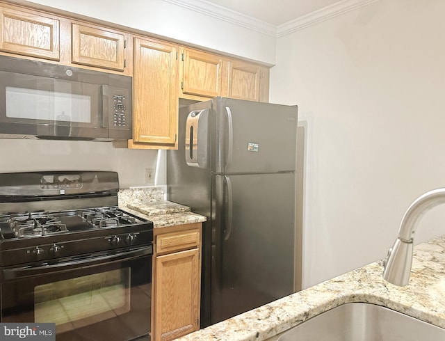 8961 Town Center Cir Unit 1-203, Upper Marlboro, MD 20774 - kitchen with black appliances, light stone countertops, a sink, and ornamental molding