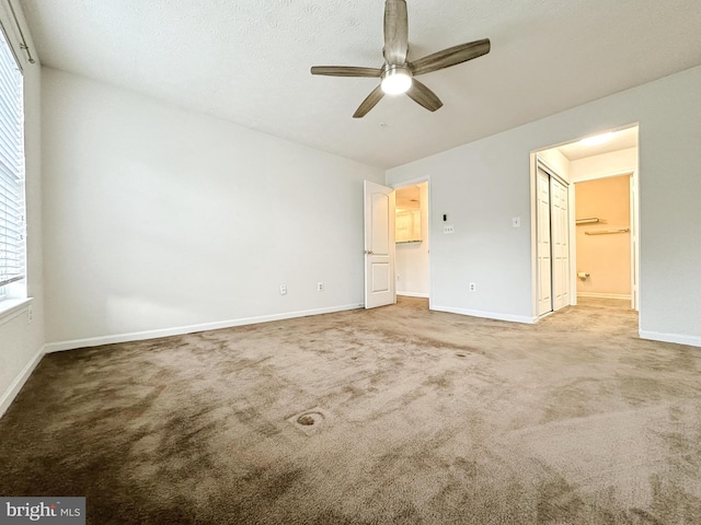 8961 Town Center Cir Unit 1-203, Upper Marlboro, MD 20774 - unfurnished bedroom featuring baseboards, carpet floors, and ceiling fan