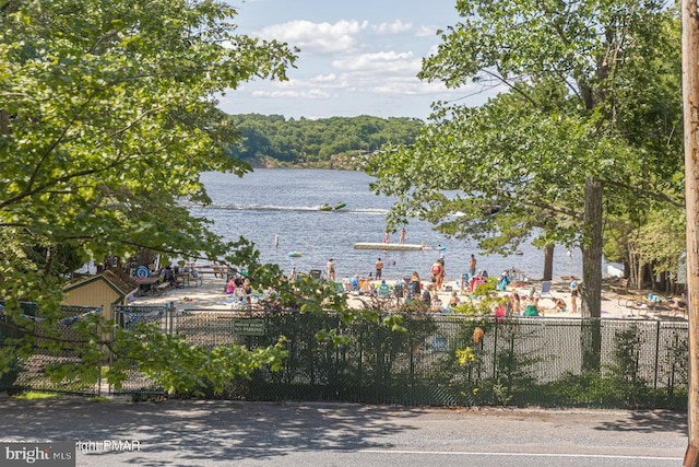 property view of water with fence