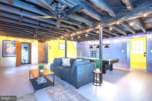 basement featuring ceiling fan and pool table