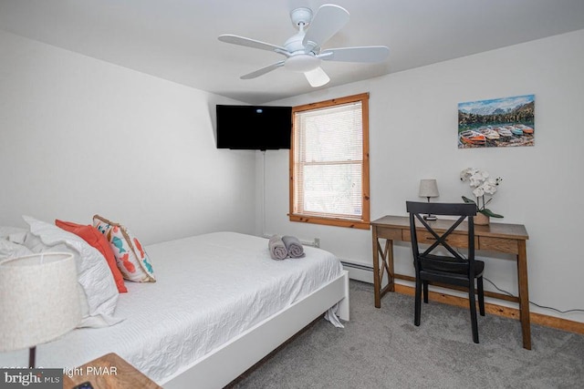 carpeted bedroom with a baseboard radiator