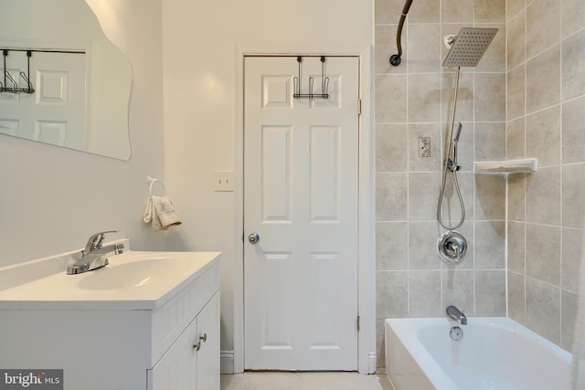 bathroom featuring tub / shower combination and vanity