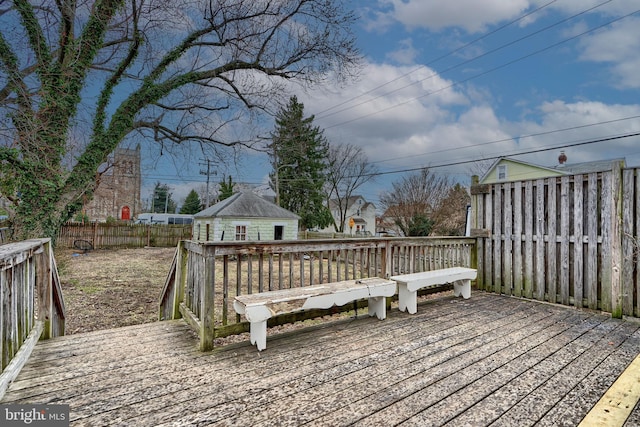 wooden deck featuring fence