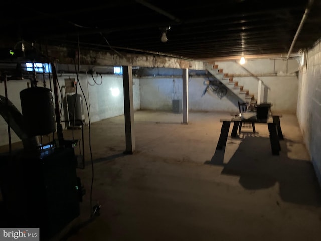 unfinished basement with stairway