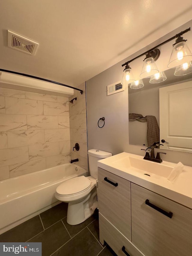 bathroom with toilet, tile patterned flooring, washtub / shower combination, and visible vents