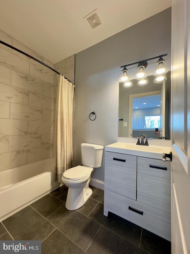 full bathroom featuring visible vents, shower / bathtub combination with curtain, toilet, vanity, and tile patterned flooring