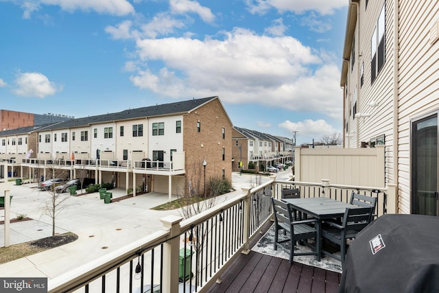 balcony featuring a residential view and grilling area