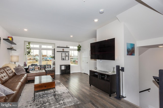 living room featuring dark wood-style flooring and recessed lighting