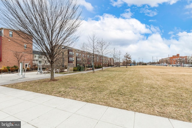 surrounding community featuring a lawn