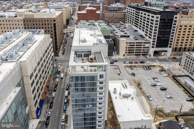 birds eye view of property with a city view