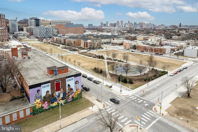 birds eye view of property featuring a view of city