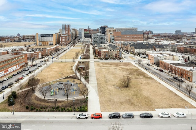 birds eye view of property with a view of city