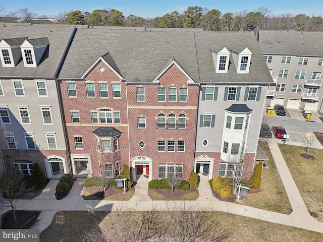 view of property with central AC unit