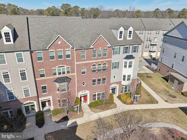 view of property with a residential view