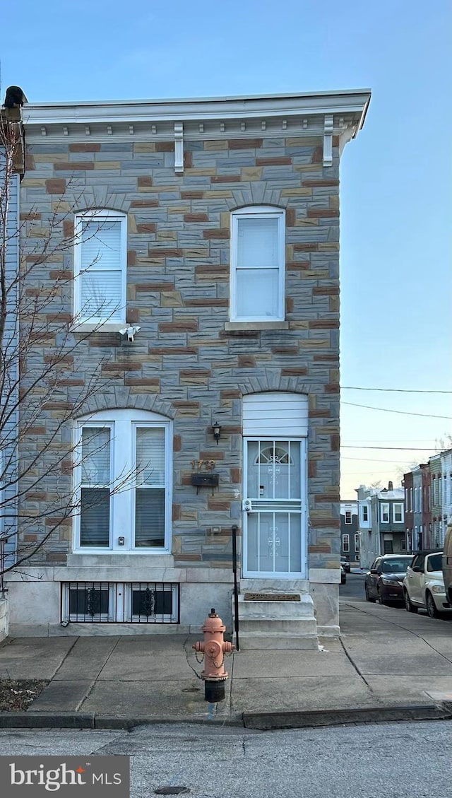 view of front of property with stone siding