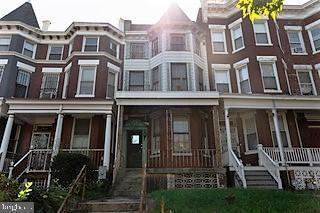 multi unit property featuring covered porch