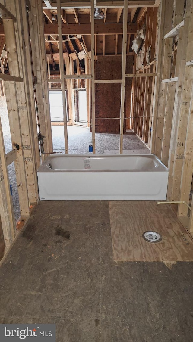 bathroom with a tub