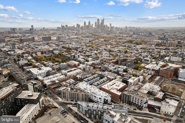 birds eye view of property featuring a city view