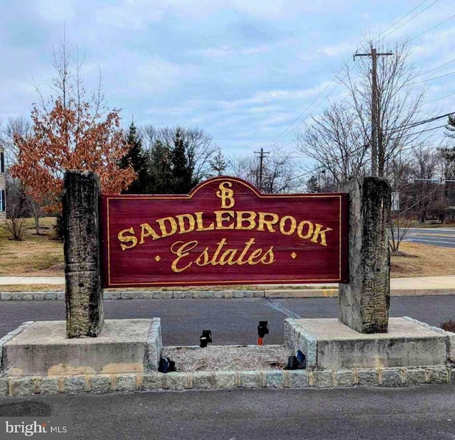 view of community sign