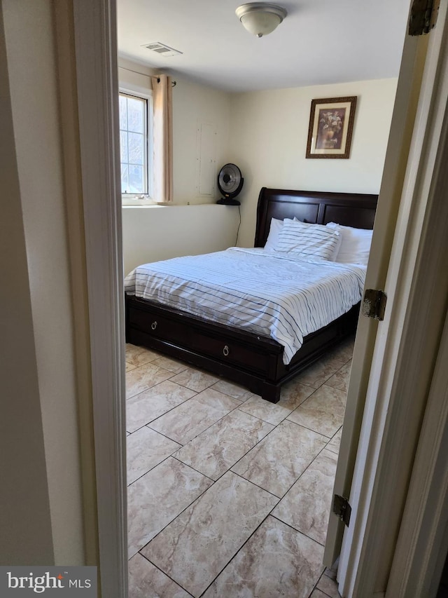 bedroom featuring visible vents