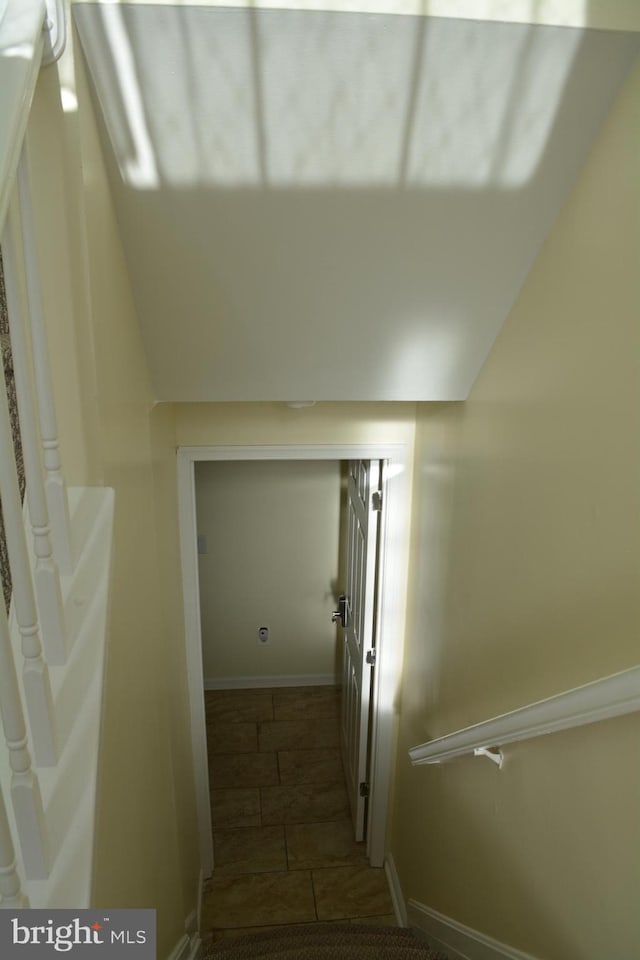 stairway with baseboards