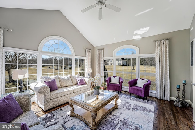 sunroom / solarium featuring lofted ceiling and a ceiling fan